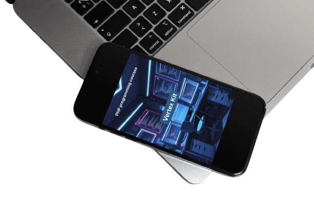 Smartphone displaying a software interface on top of a laptop